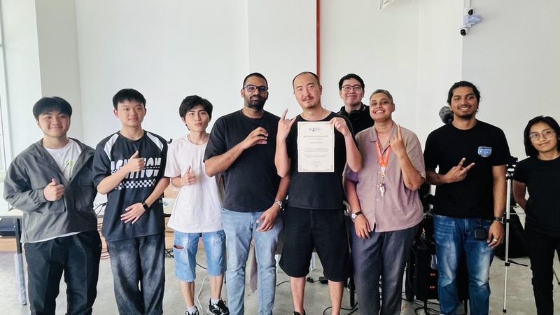 Audio design professionals with music business students at an industry sharing session